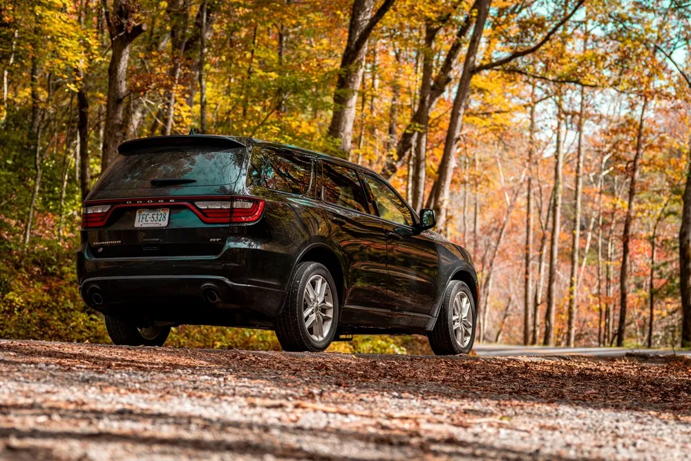 Dodge Durango on an autumn road