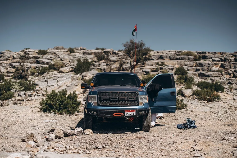 Ford Escape parked on rocky ground
