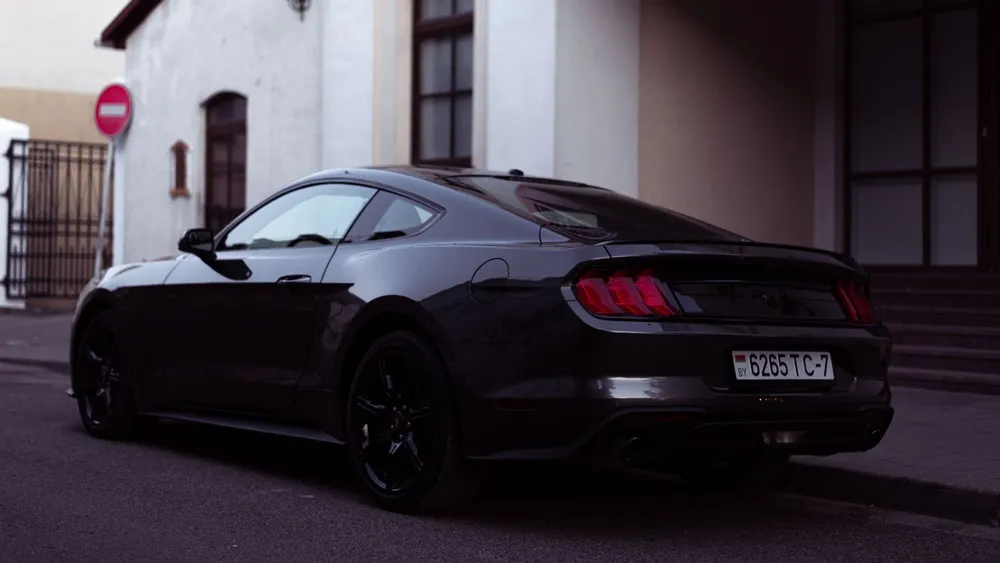 Ford Mustang from behind on a city street