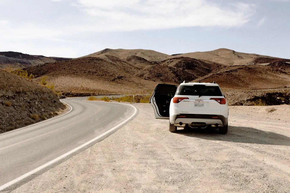 GMC Acadia on a desert road