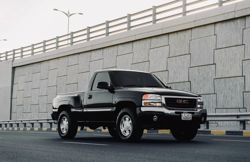 GMC Sierra under an overpass